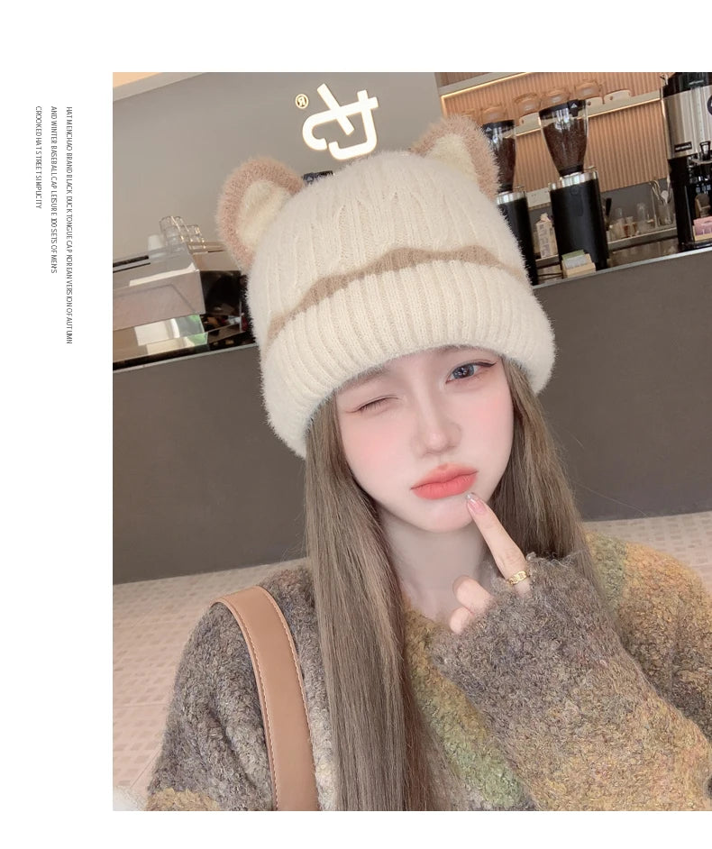 Face displaying kitten ear knitting wool hat